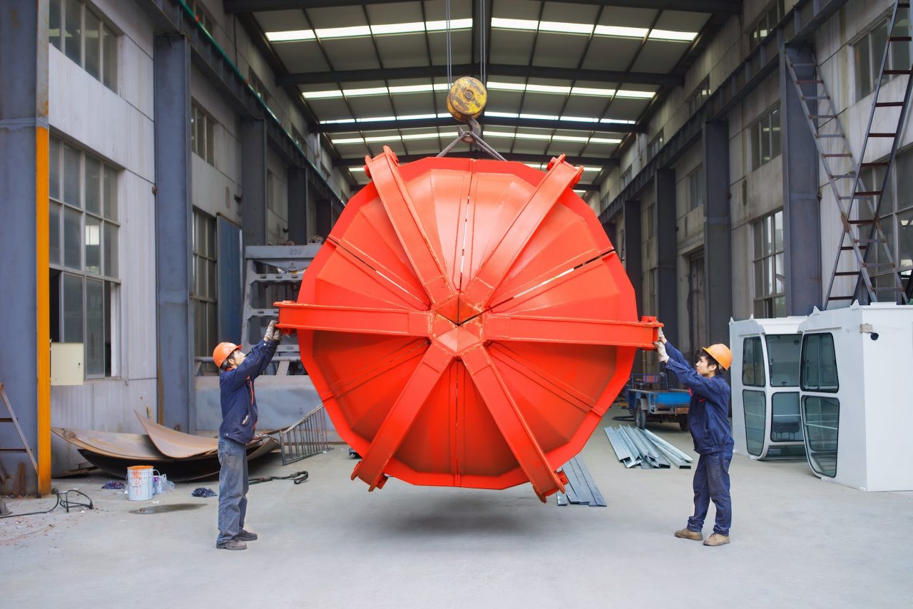 workers working together in crane manufacturing facility china